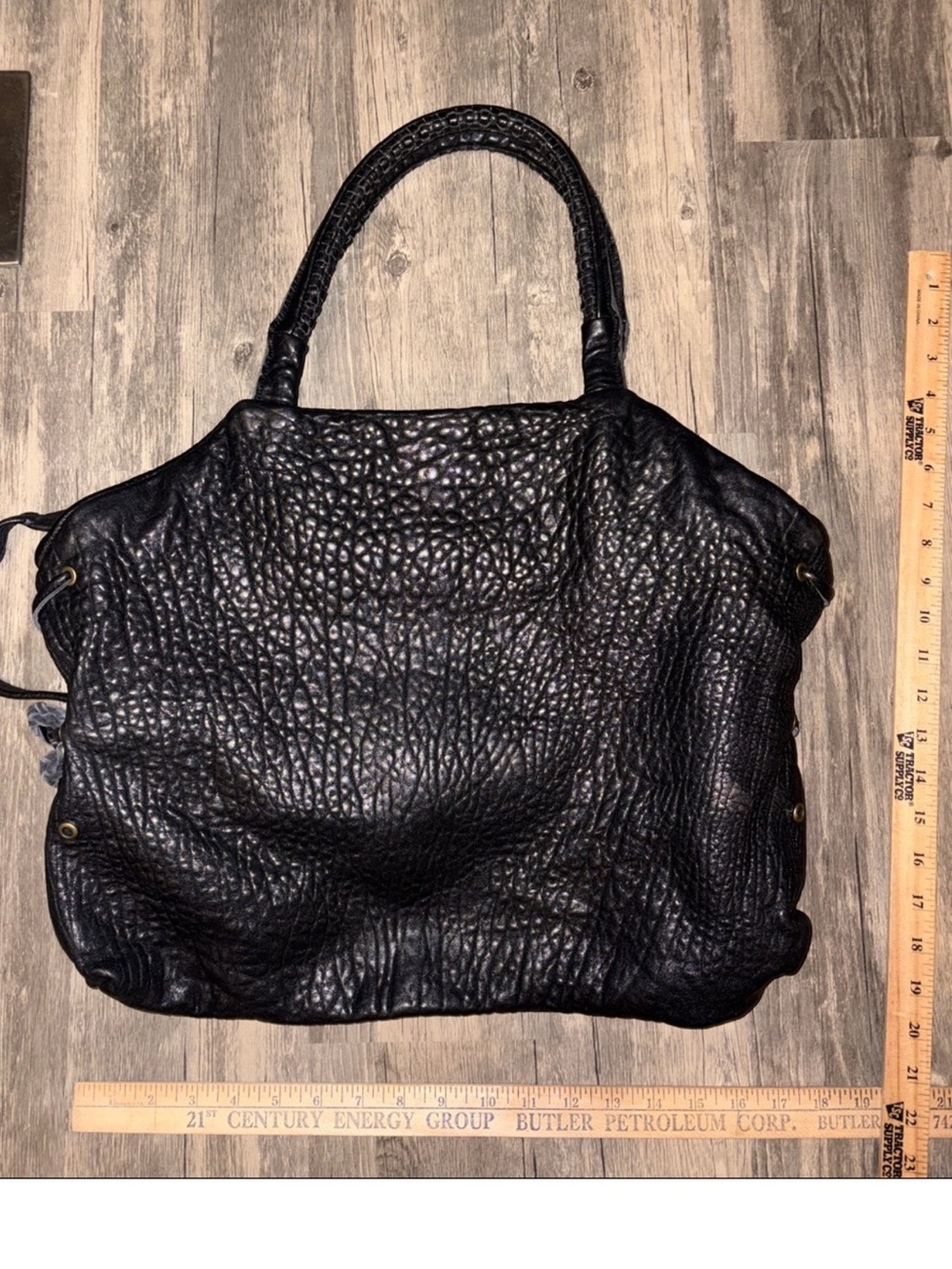 Handmade leather Y2K style hobo handbag retail is 399.00
